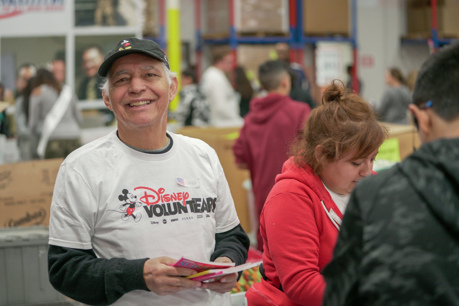 Corporate volunteers celebrating at an Operation Gratitude event