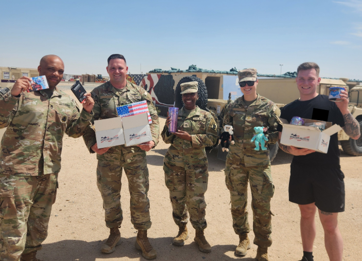 Service member receiving care package