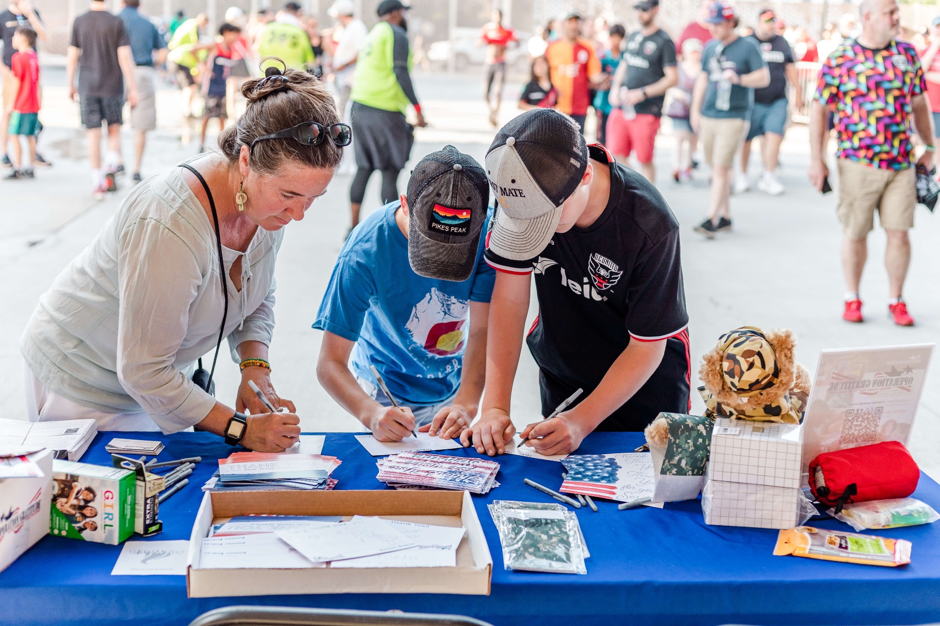Volunteers writing letters